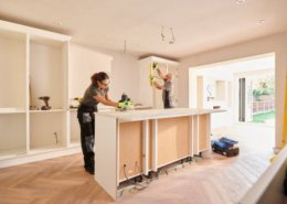kitchen fitters installing some cabinets