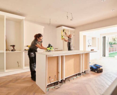 kitchen fitters installing some cabinets